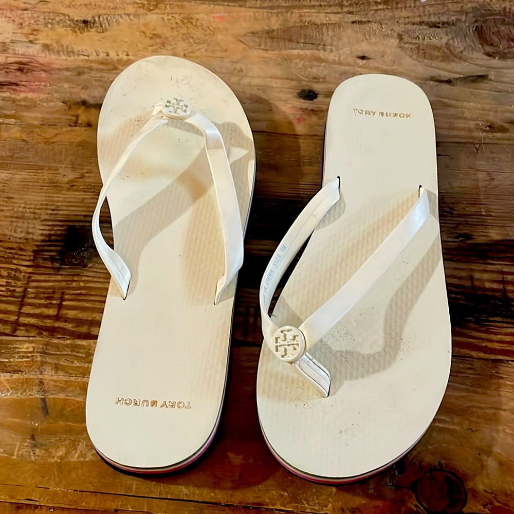 Tory Burch cream flip flops size 9 with navy, pink, cream and hunter green strip